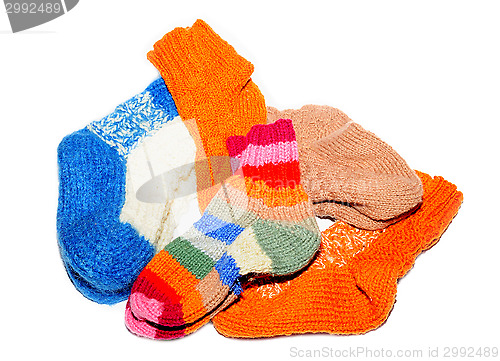 Image of Warm knitted woolen socks knitting needles isolated on a white background