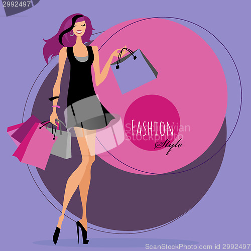 Image of Fashion girl. Woman with shopping bags.