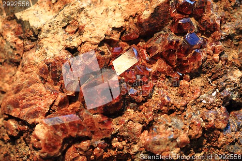 Image of red garnet mineral background