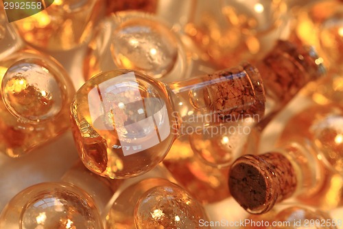 Image of gold in the bottles 