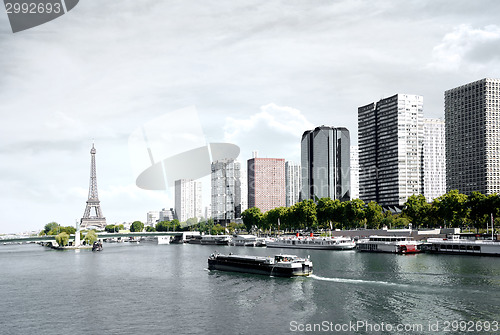 Image of Paris, barge on the Seine and Eiffel tower
