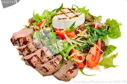 Image of Veal meat with fresh vegetable salad