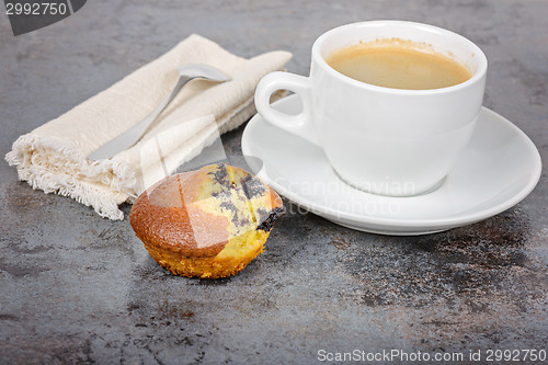 Image of Homemade cupcake and a mug of coffee