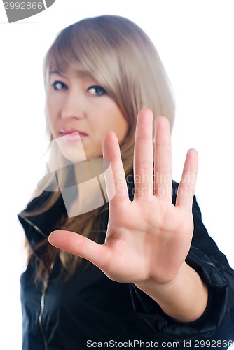 Image of Pretty girl with stop gesture