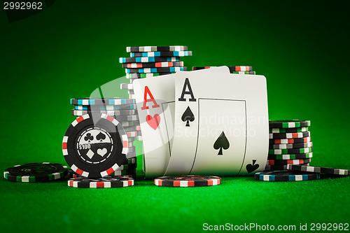 Image of chips and two aces