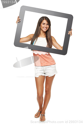 Image of Woman looking through frame