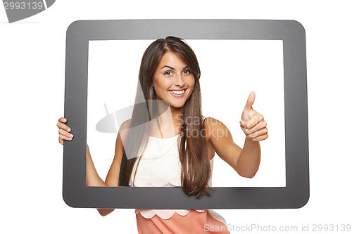 Image of Woman looking through frame