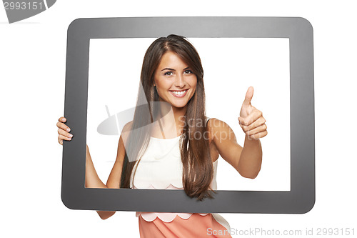 Image of Woman looking through frame