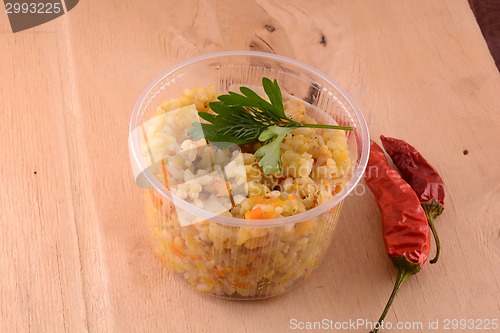 Image of Chinese cuisine - fried rice with meat and papper