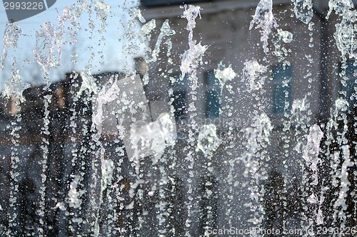 Image of Water stream splashing on fountain