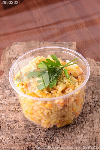 Image of Chinese cuisine - fried rice with meat and papper