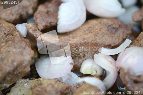 Image of fresh ripe roasted beef meat with onion