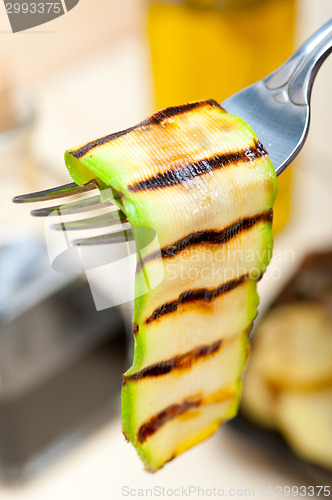 Image of grilled zucchini courgette on a fork