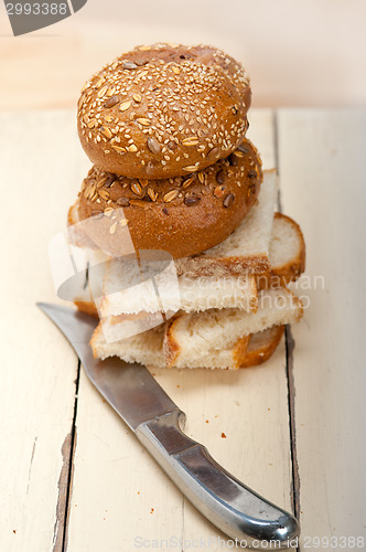 Image of organic bread over rustic table
