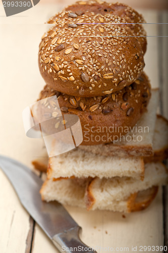 Image of organic bread over rustic table