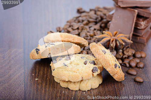 Image of Close up cookies, coffee beans and chocolate