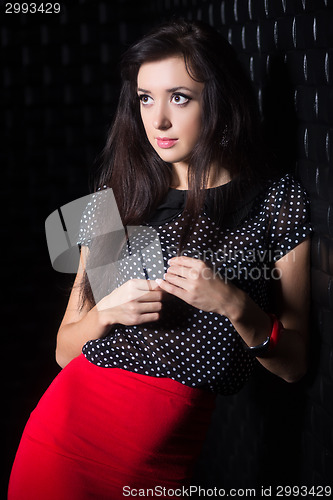 Image of Portrait of young thoughtful woman