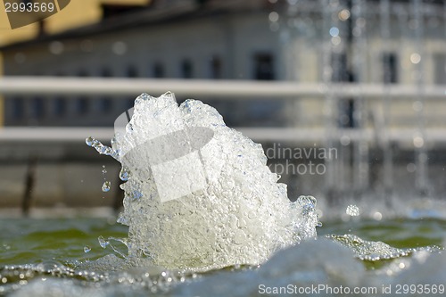 Image of Water stream splashing on fountain