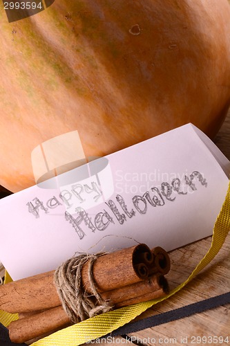 Image of pumpkin on wooden table, happy halloween concept