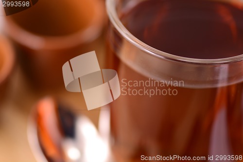 Image of A cup of tea on wooden background