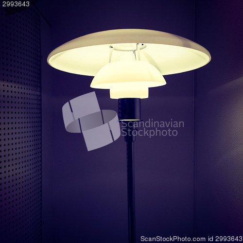 Image of Stylish lamp in a dark room