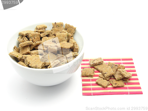 Image of Selfmade dog cookies in a bowl of chinaware