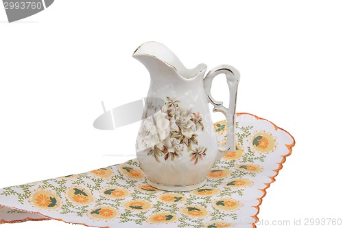 Image of Old flower vase on cloth