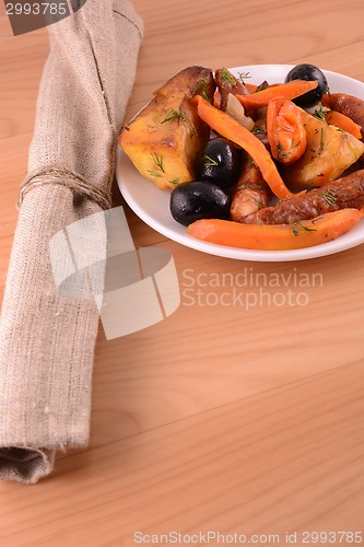 Image of Fresh tasty Russian salad served with carrots