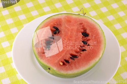 Image of Slices of fresh water melon on the white plate