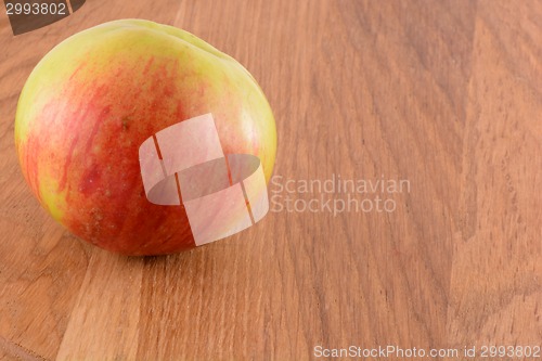 Image of Apples on wooden background