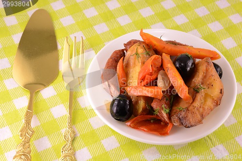 Image of fresh salad with olives sausage carrot