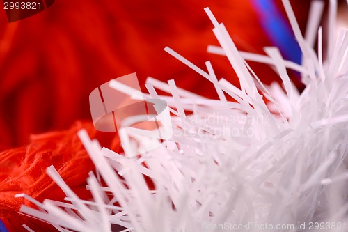 Image of christmas decoration with white fir and blue ribbon