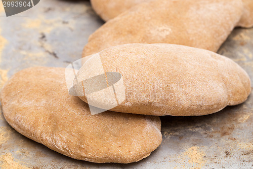 Image of Loaves of puffed homemade Egyptian pita