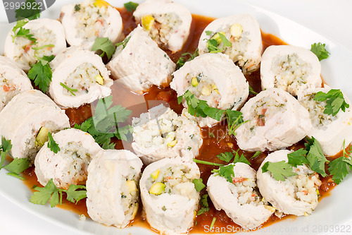 Image of Serving dish of stuffed chicken breasts
