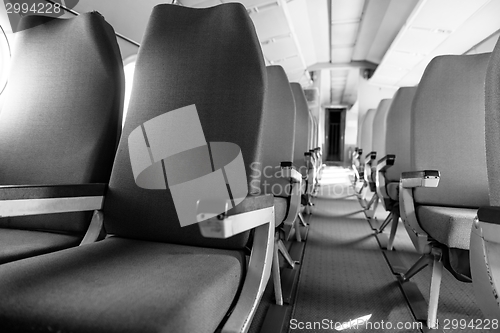 Image of Interior of an airplane with many seats