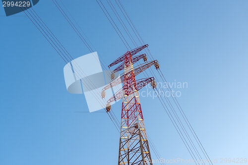 Image of Large transmission towers at sunset