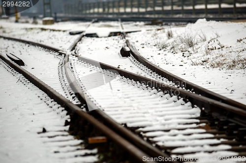 Image of Railroad tracks in the snow