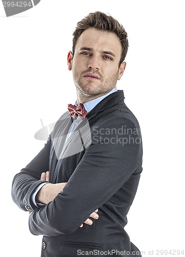 Image of Young Businessman with Arms Crossed