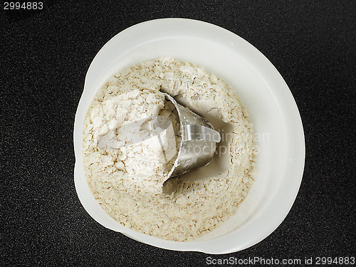 Image of Measurement tool in a bowl of wheat flour