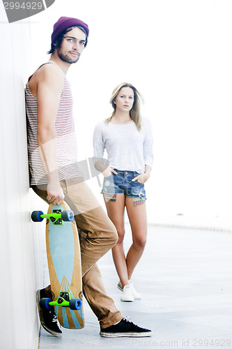 Image of Skateboarding couple