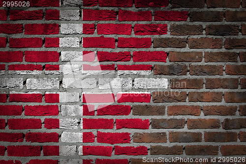 Image of Brick wall texture with flag