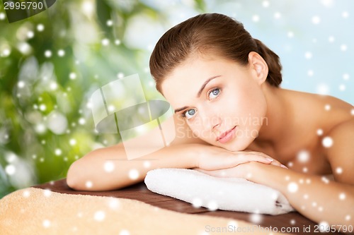 Image of beautiful young woman in spa