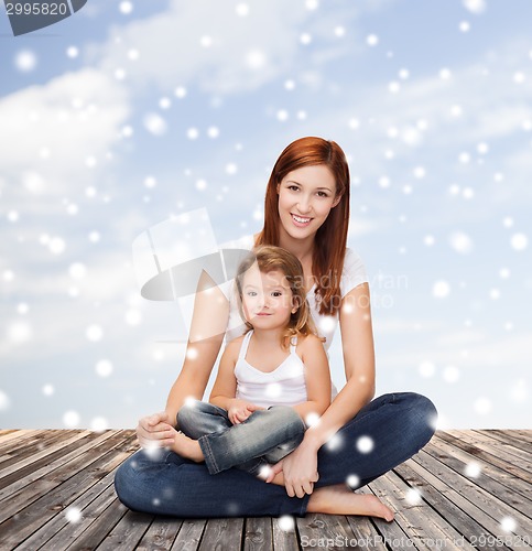 Image of happy mother with little girl