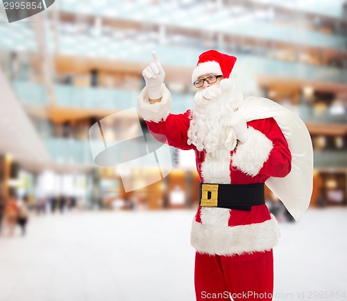 Image of man in costume of santa claus with bag