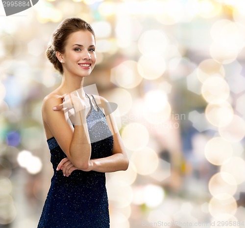 Image of smiling woman in evening dress