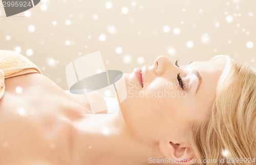 Image of beautiful young woman in spa
