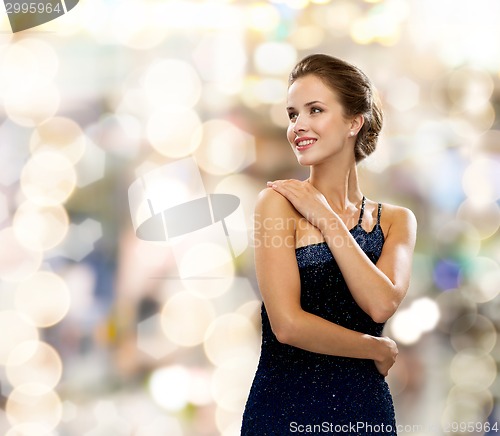 Image of smiling woman in evening dress