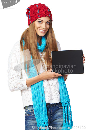 Image of Winter woman showing tablet screen