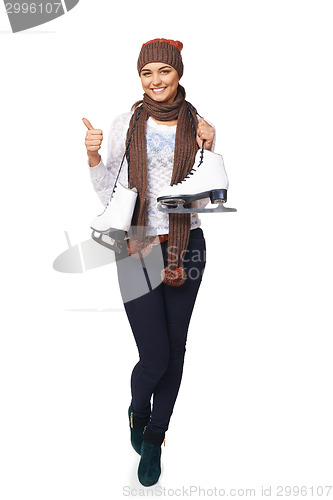 Image of Woman with ice skates