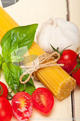 Image of Italian spaghetti pasta tomato and basil